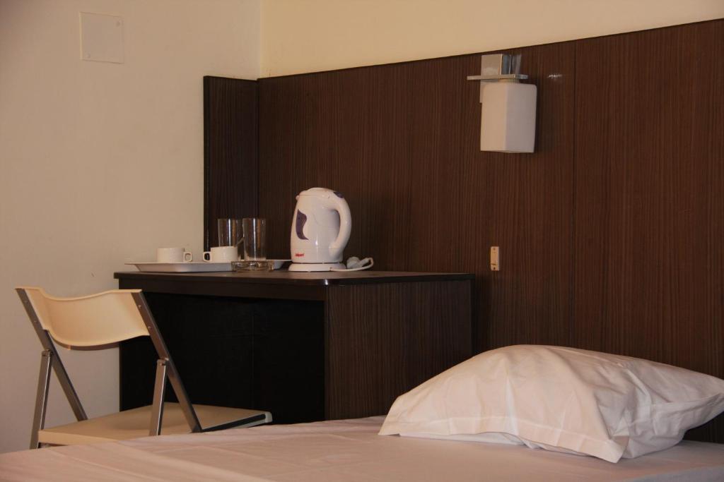 Down Town Guest House Kalkutta Szoba fotó